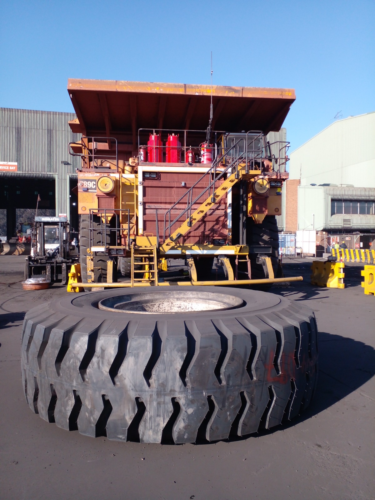 Mechanic rebuilding earthmoving equipment